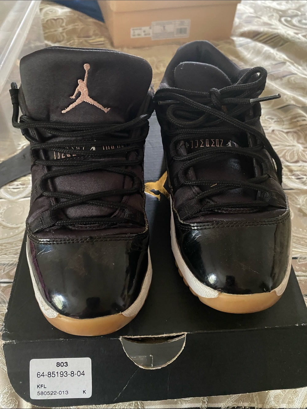 Jordan 11 Kids' Black and Gum Low-Top Retro Sneakers